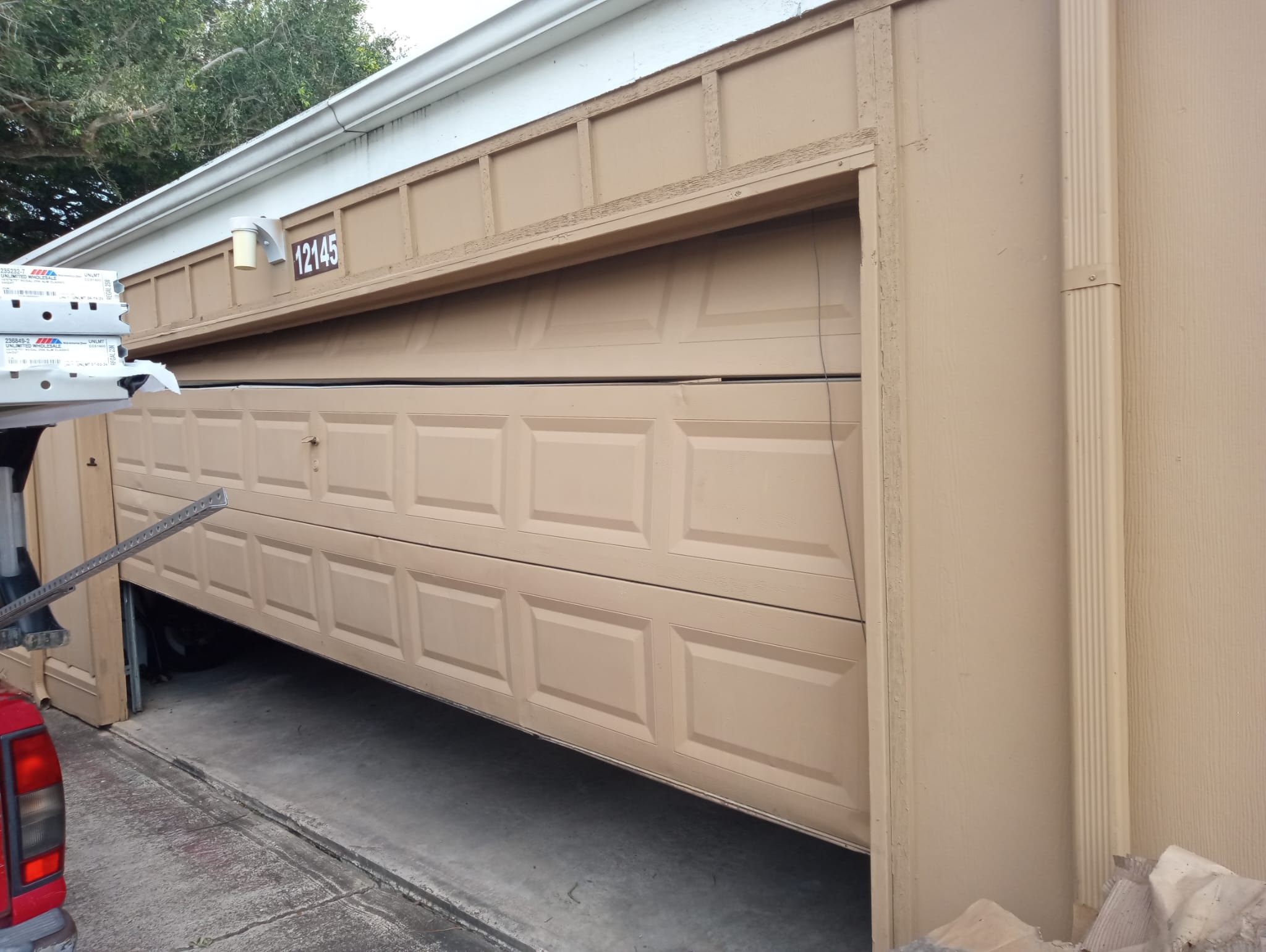 # Expert Broken Spring Repair in Bellaire, TX - Fast and Affordable Service When your garage door is stuck or... - Lemus Garage Door Services Sugar Land TX