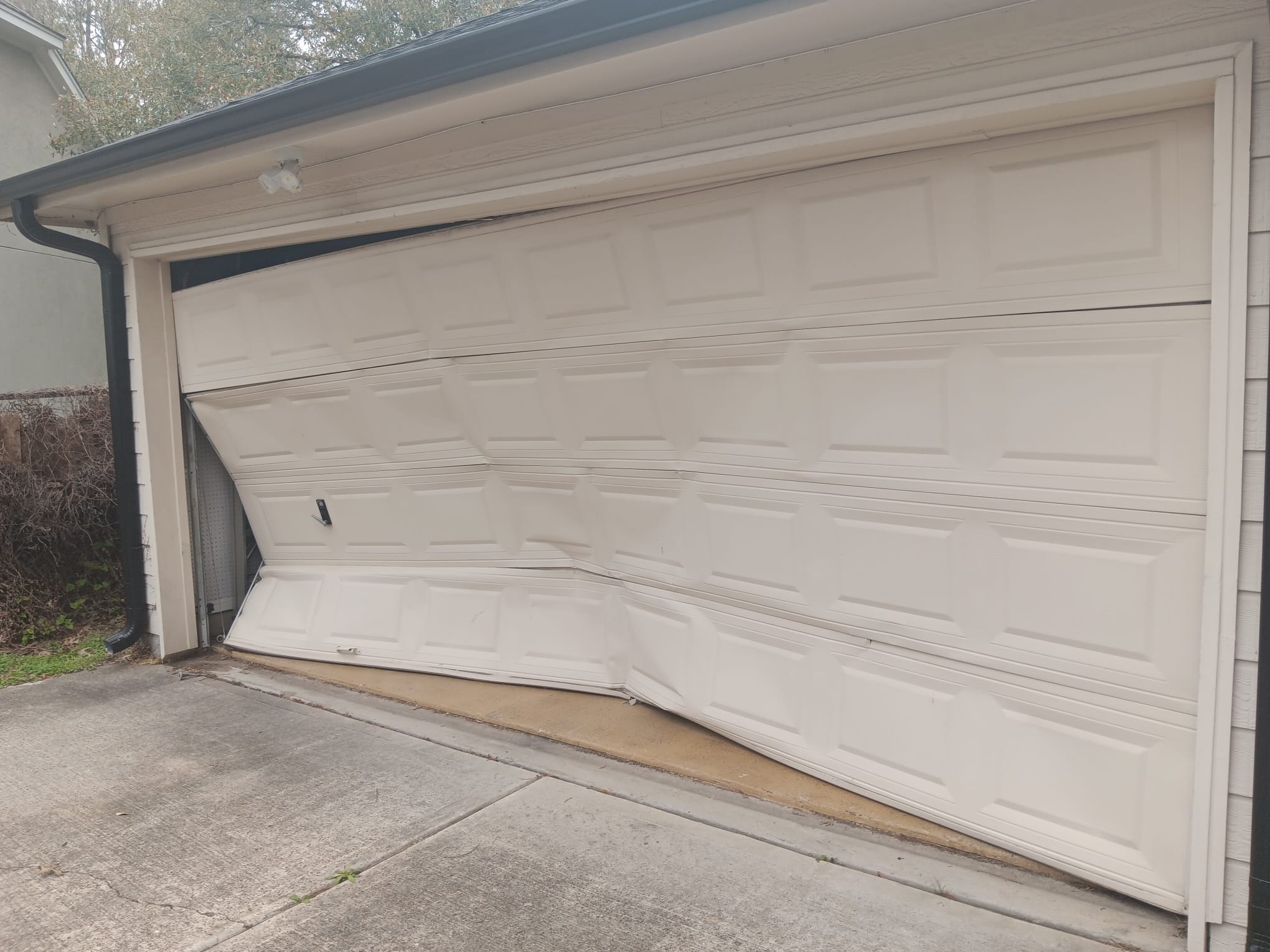 Broken Spring Repair in Bellaire, TX - Same Day Service - Lemus Garage Door Services Sugar Land TX