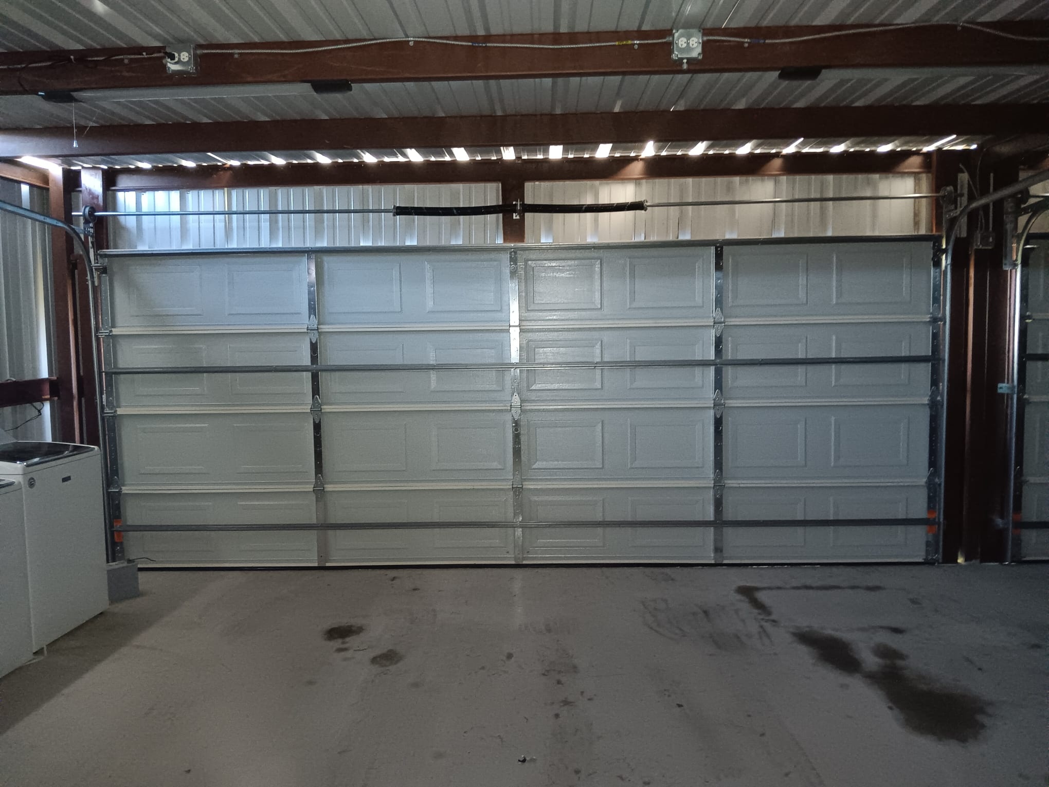 Expert Torsion Spring Repair in Sugar Land, TX - Same-Day Service - Lemus Garage Door Services Sugar Land TX